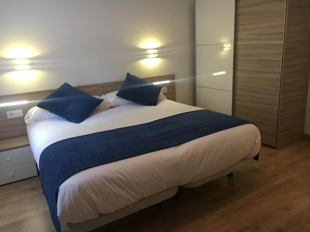 Postel nebo postele na pokoji v ubytování Hotel Marxant