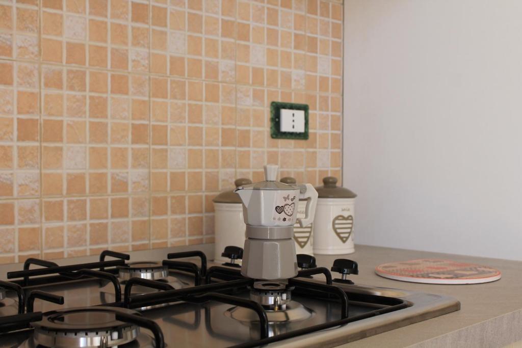 Kuchyňa alebo kuchynka v ubytovaní Casa Sole e Vento