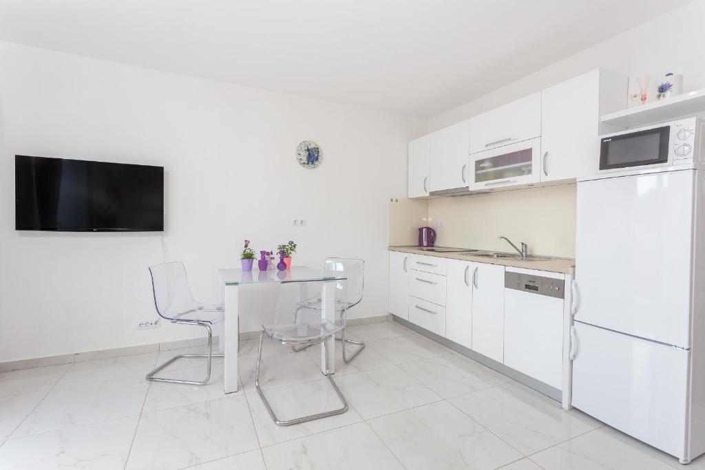 Kuchyňa alebo kuchynka v ubytovaní Apartments Gabelic