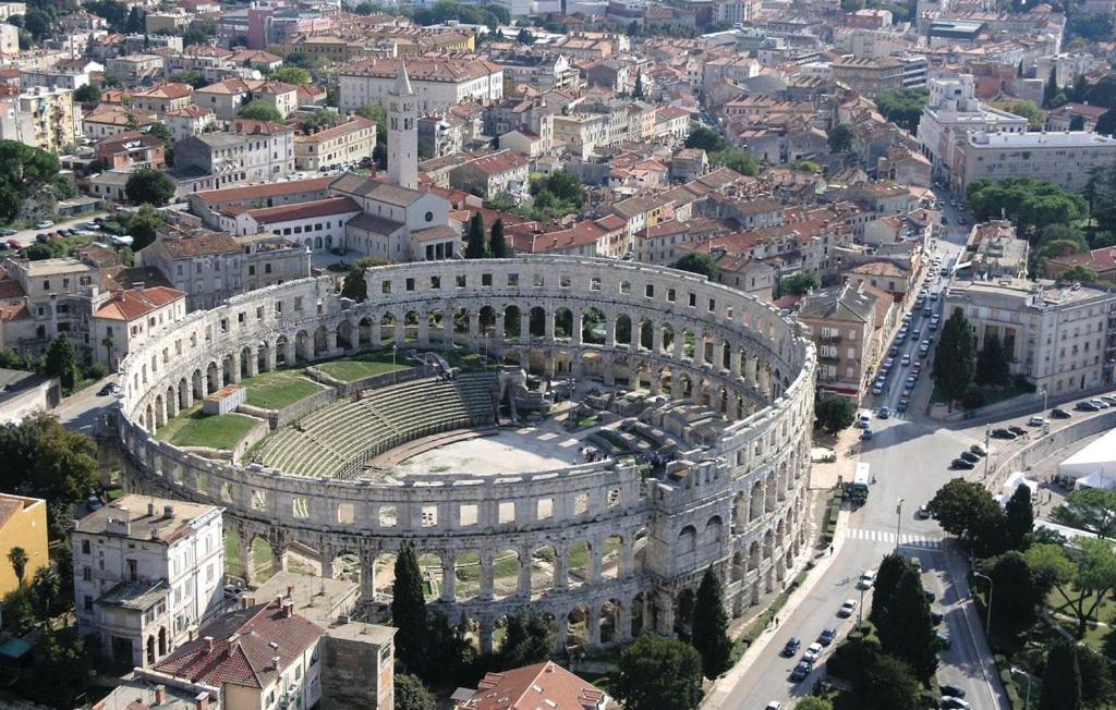 an aerial view of a building in a city at Apartment Old Town in Pula