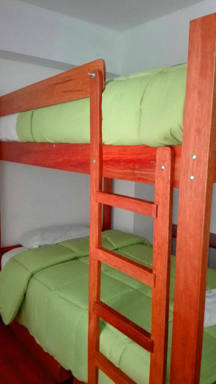 Postel nebo postele na pokoji v ubytování La Posada del Rey - Lima Airport Hostel