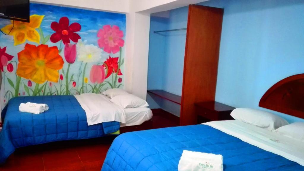 Postel nebo postele na pokoji v ubytování La Posada del Rey - Lima Airport Hostel