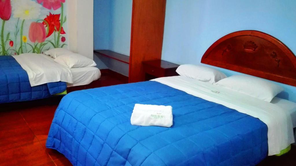 Postel nebo postele na pokoji v ubytování La Posada del Rey - Lima Airport Hostel