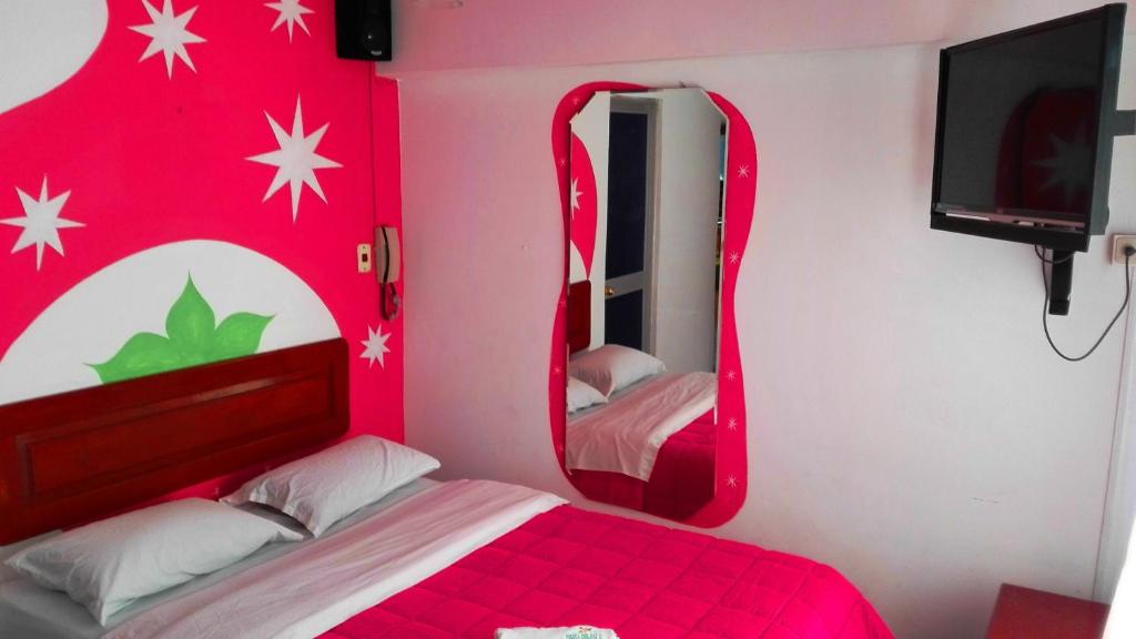 Postel nebo postele na pokoji v ubytování La Posada del Rey - Lima Airport Hostel