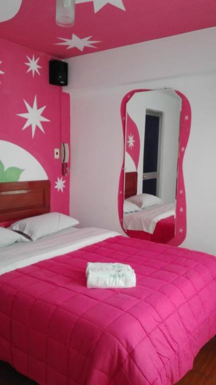 Postel nebo postele na pokoji v ubytování La Posada del Rey - Lima Airport Hostel