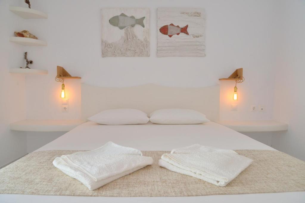 Postel nebo postele na pokoji v ubytování Hotel Apartments Giannis