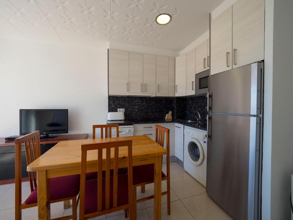 Kuchyň nebo kuchyňský kout v ubytování InmoSantos Oasis B5