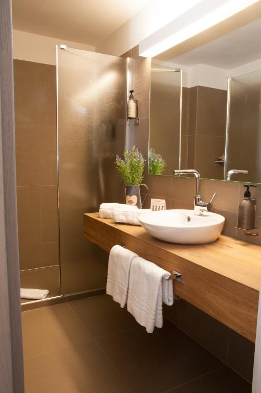 Kúpeľňa v ubytovaní Alexander Charme Hotel