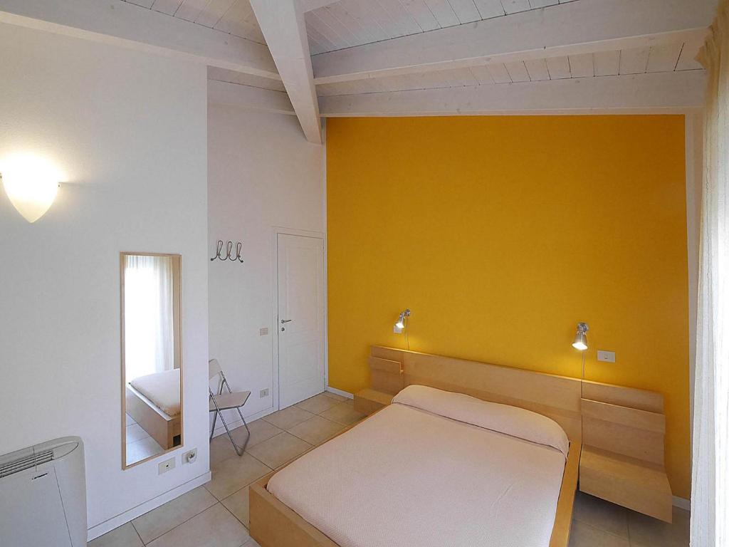 Łóżko lub łóżka w pokoju w obiekcie Residence Villa Livia