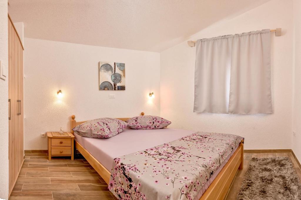 Posteľ alebo postele v izbe v ubytovaní Beach Resort Apartments Bucina