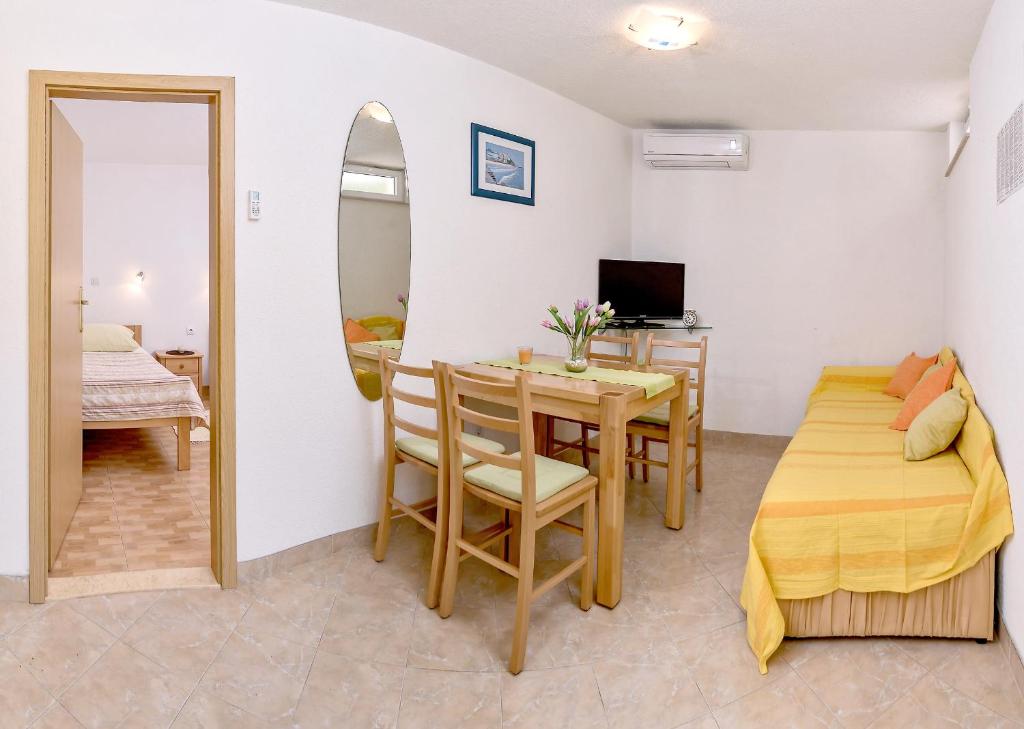 Posedenie v ubytovaní Beach Resort Apartments Bucina