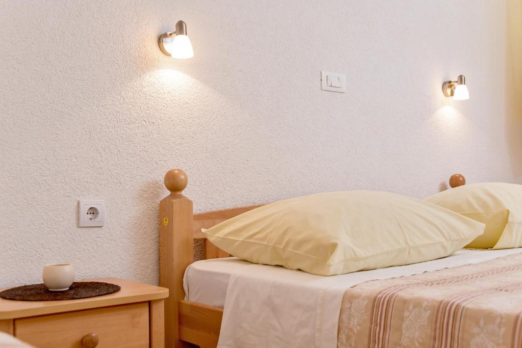 Posteľ alebo postele v izbe v ubytovaní Beach Resort Apartments Bucina