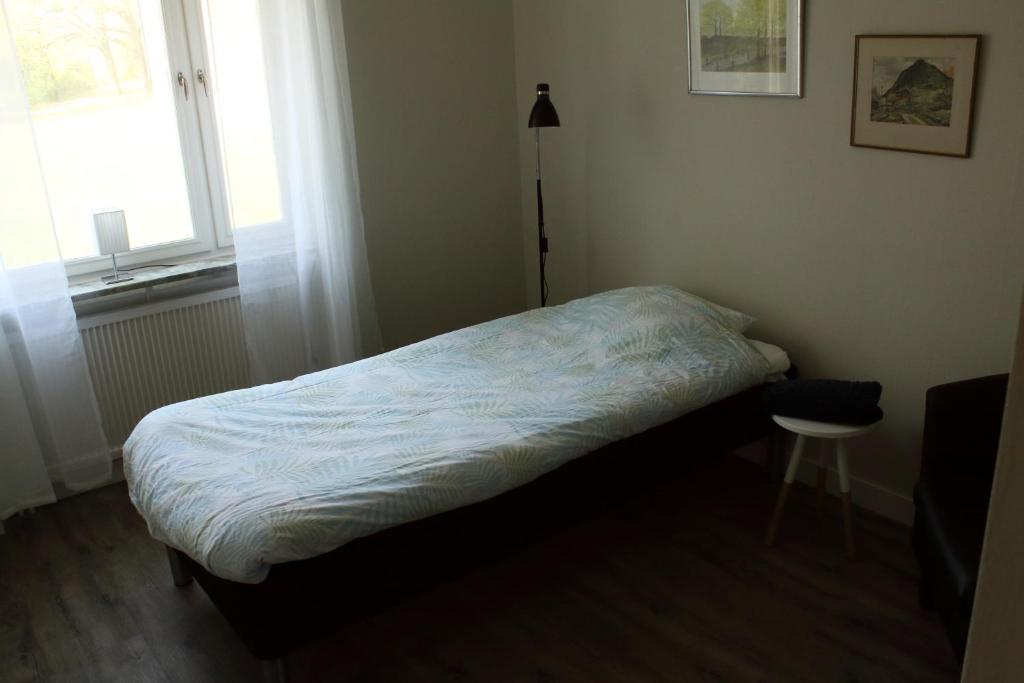 Postel nebo postele na pokoji v ubytování Ekbackens Vandrarhem