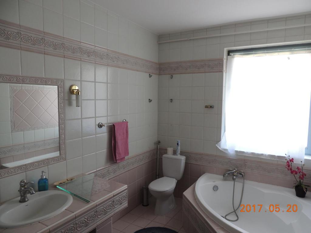 Kúpeľňa v ubytovaní Eszter Apartman