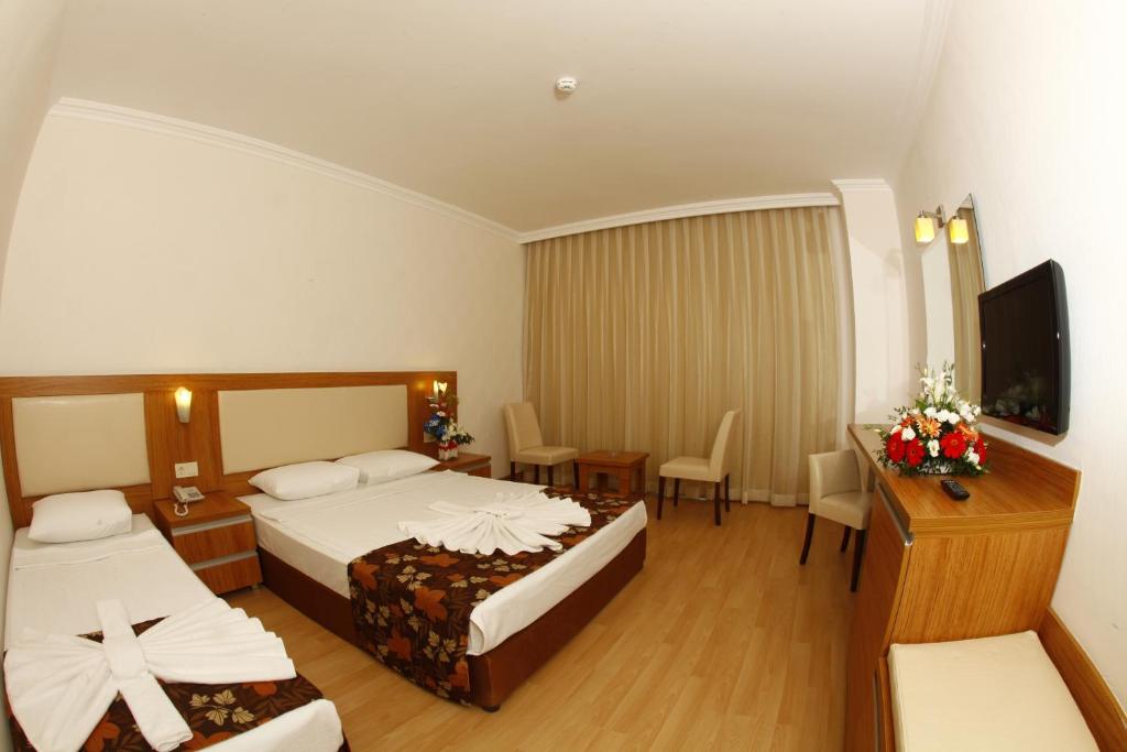 Postel nebo postele na pokoji v ubytování Cenger Beach Resort Spa - All Inclusive