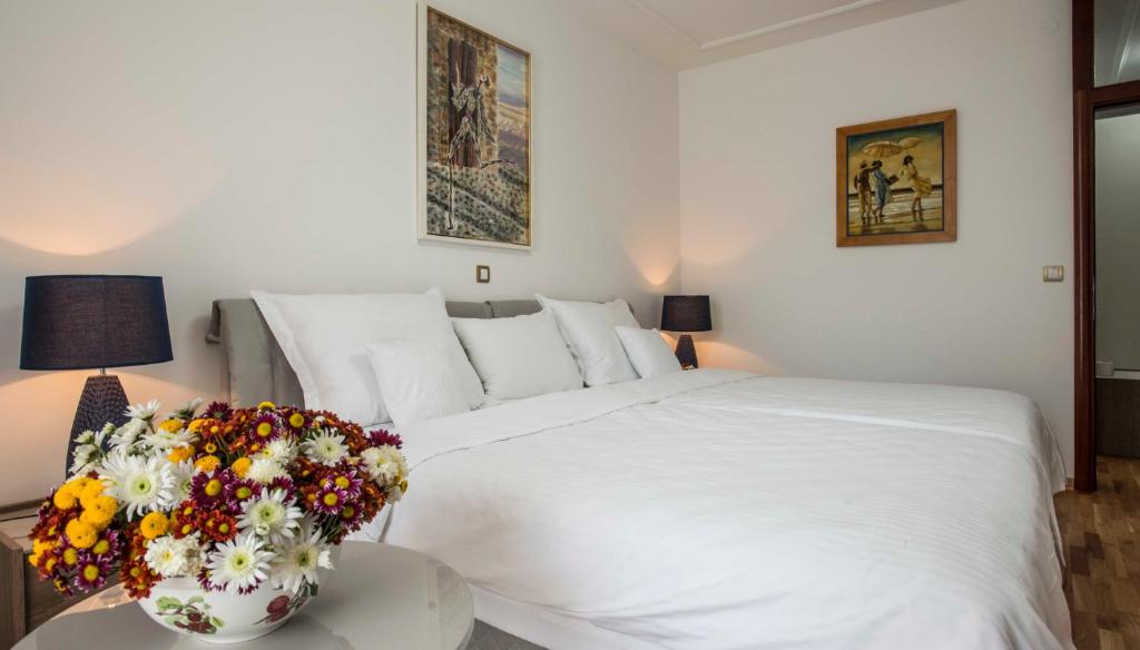 Postel nebo postele na pokoji v ubytování Hotel Radmilovac