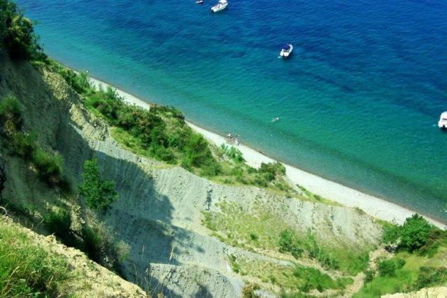 an aerial view of a beach with boats in the water at Apartments Baredi in Izola