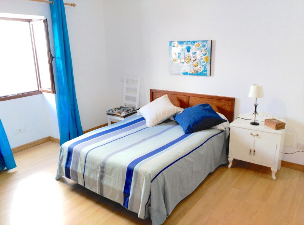 Postel nebo postele na pokoji v ubytování Villa Canaria piscina jacuzzi jardín