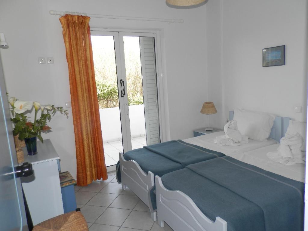 Postel nebo postele na pokoji v ubytování Silvi Mari Apartments