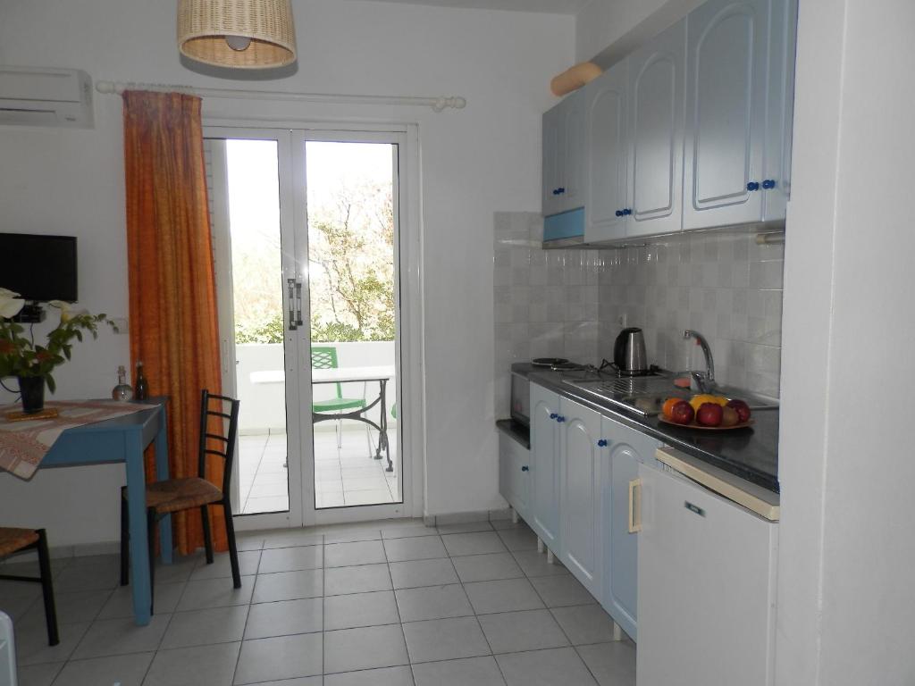 Kuchyň nebo kuchyňský kout v ubytování Silvi Mari Apartments