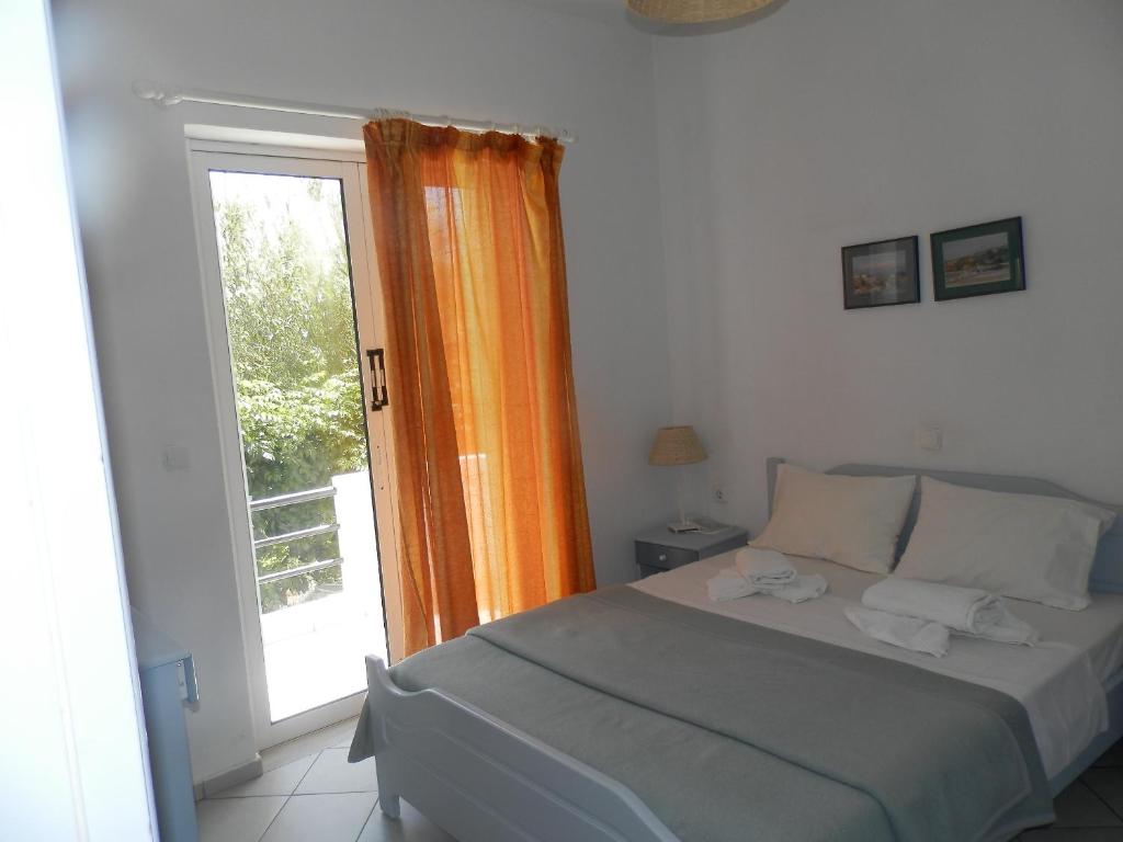 Postel nebo postele na pokoji v ubytování Silvi Mari Apartments