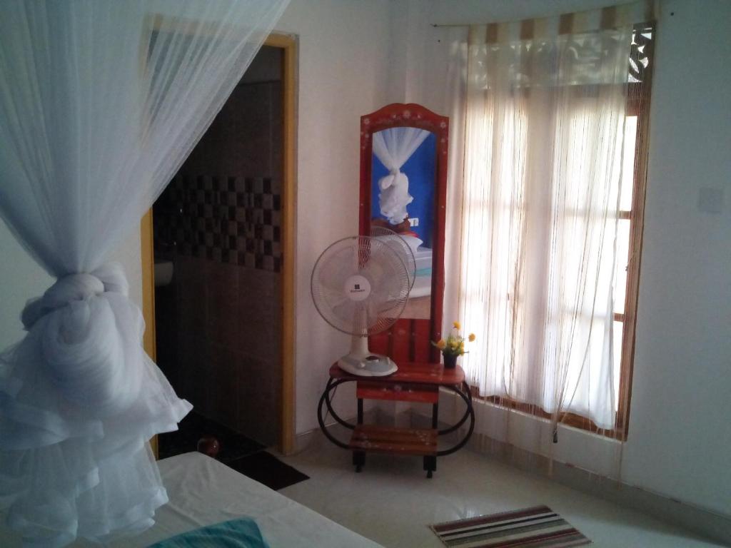 Postel nebo postele na pokoji v ubytování Mellow Homestay