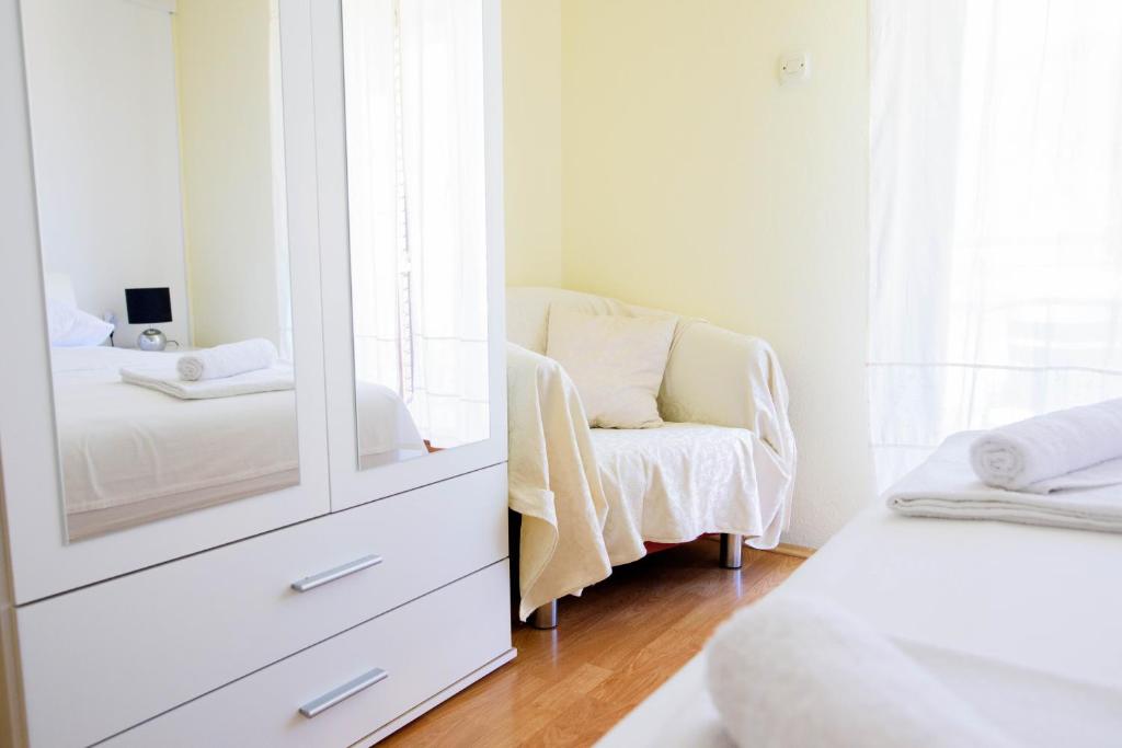 Posteľ alebo postele v izbe v ubytovaní Apartment ANA Podstrana