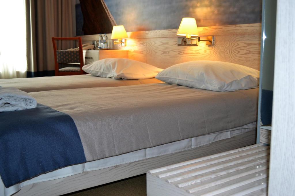 Postel nebo postele na pokoji v ubytování Hotel Morski