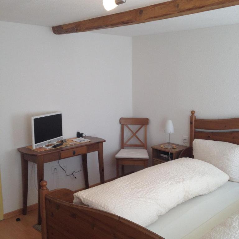 Postel nebo postele na pokoji v ubytování Hotel Sternen