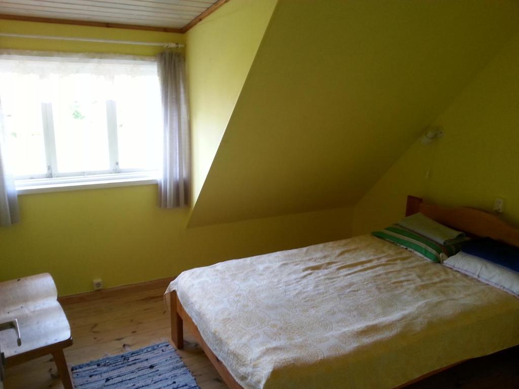 Postel nebo postele na pokoji v ubytování Kuus Tuba