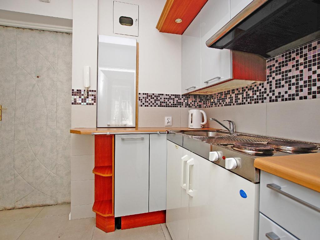 Kuchyňa alebo kuchynka v ubytovaní Apartament Starogdański 4