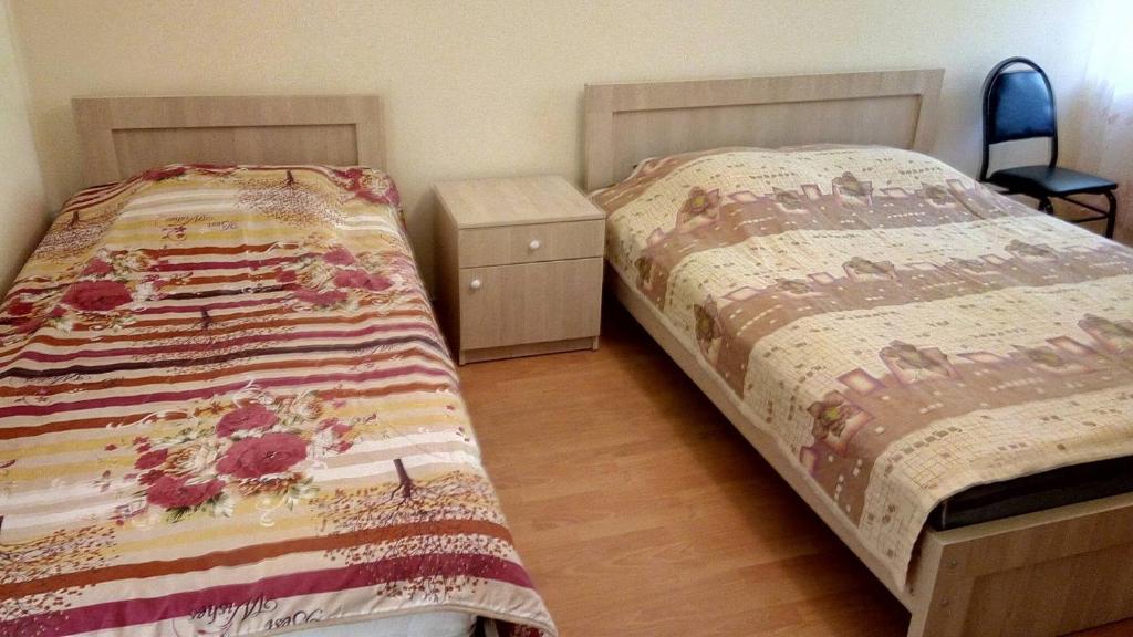 Postel nebo postele na pokoji v ubytování Mari Guest House