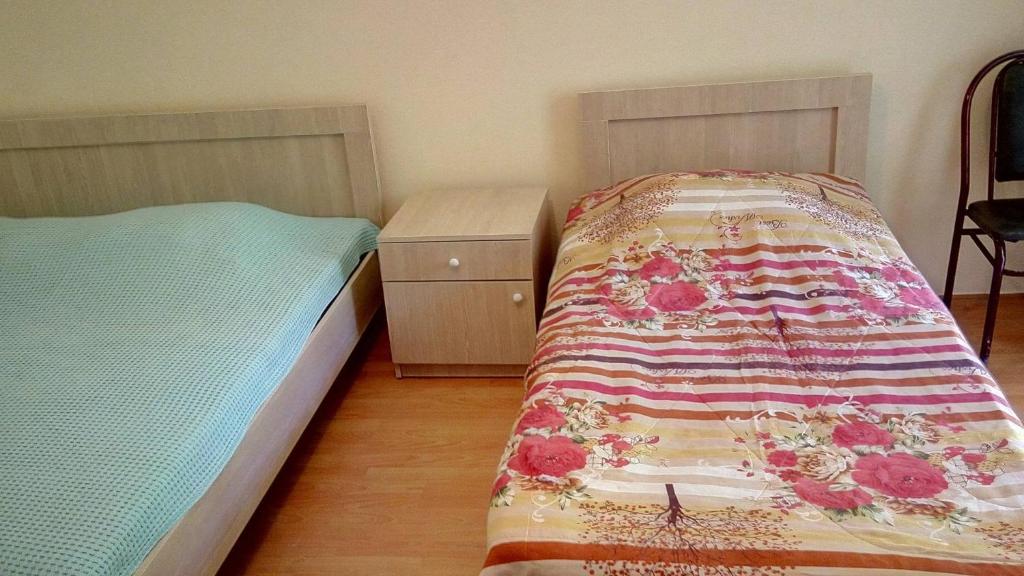 Postel nebo postele na pokoji v ubytování Mari Guest House