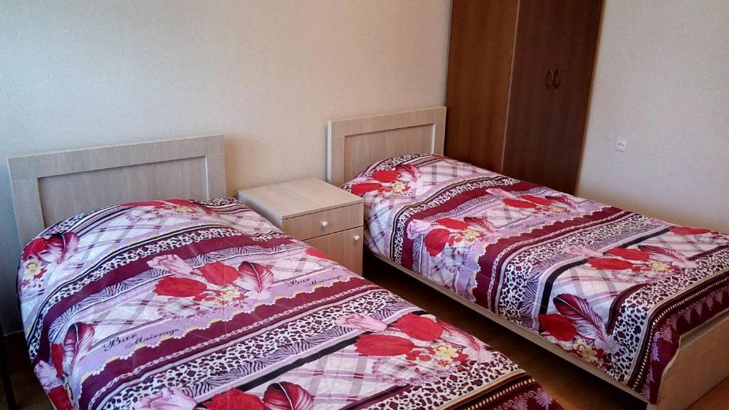Postel nebo postele na pokoji v ubytování Mari Guest House