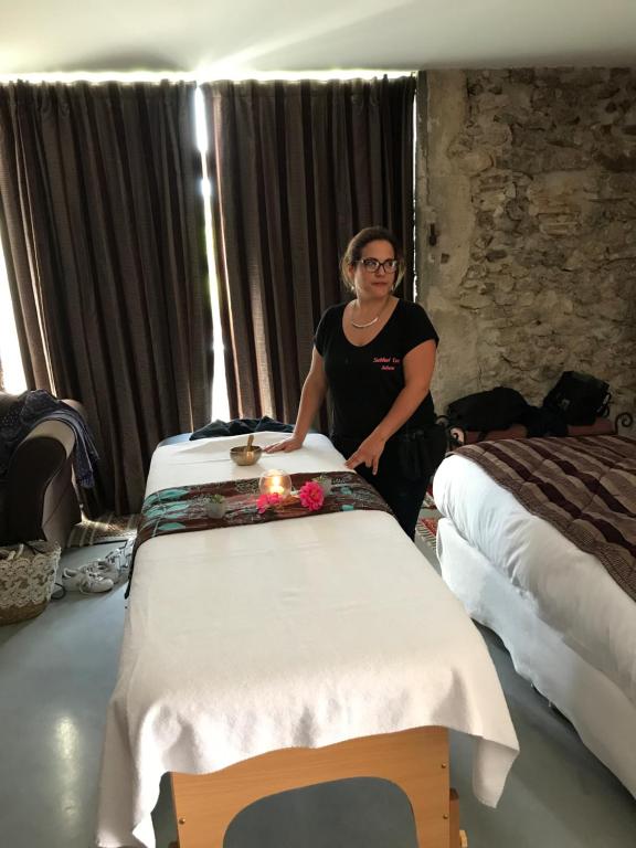 Postel nebo postele na pokoji v ubytování Le Trésor des Templiers
