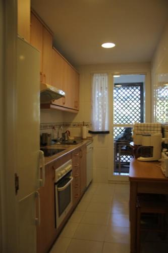 Kuchyňa alebo kuchynka v ubytovaní Bonito apartamento en Nueva Andalucia