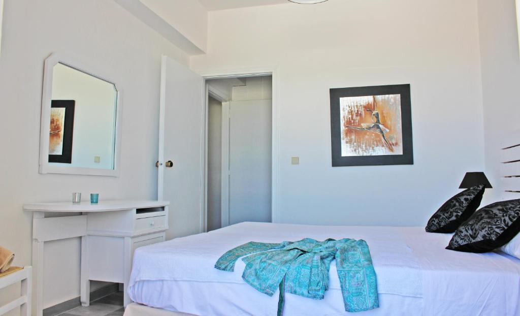 Postel nebo postele na pokoji v ubytování Castello Bianco Aparthotel