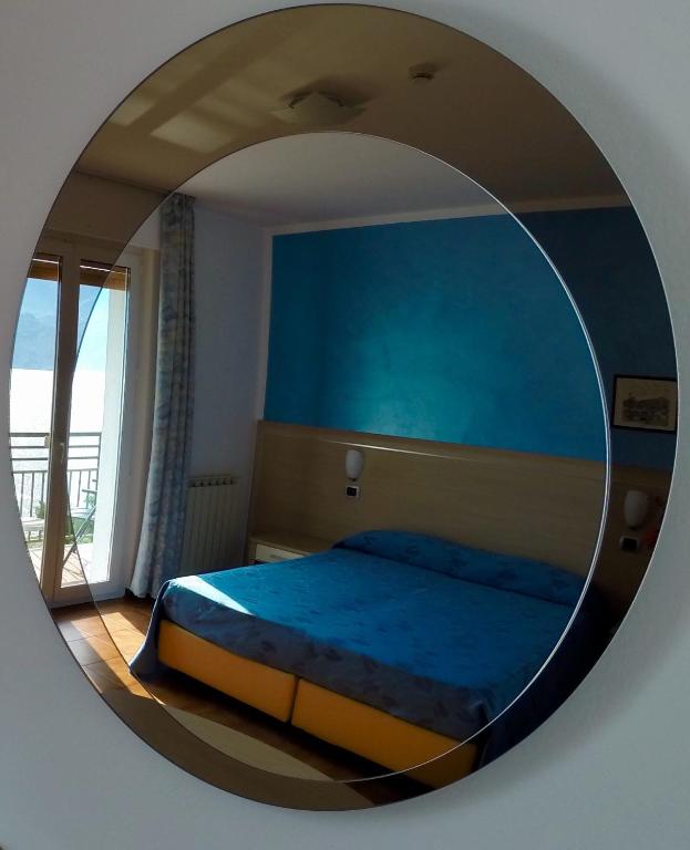 Postel nebo postele na pokoji v ubytování Albergo Villa Edera
