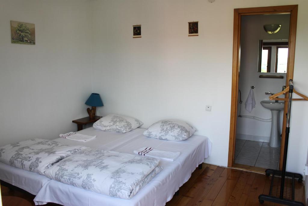 Postel nebo postele na pokoji v ubytování Casa Altius Felix