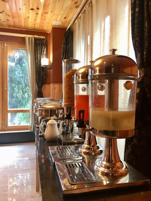 Kuchyň nebo kuchyňský kout v ubytování Hotel Khamsum