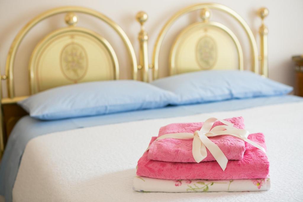 Postel nebo postele na pokoji v ubytování Casa Gambuzza