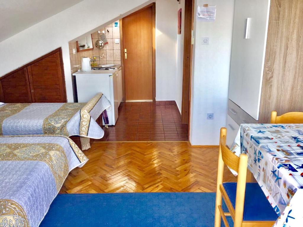 Postel nebo postele na pokoji v ubytování Apartment Martinovic