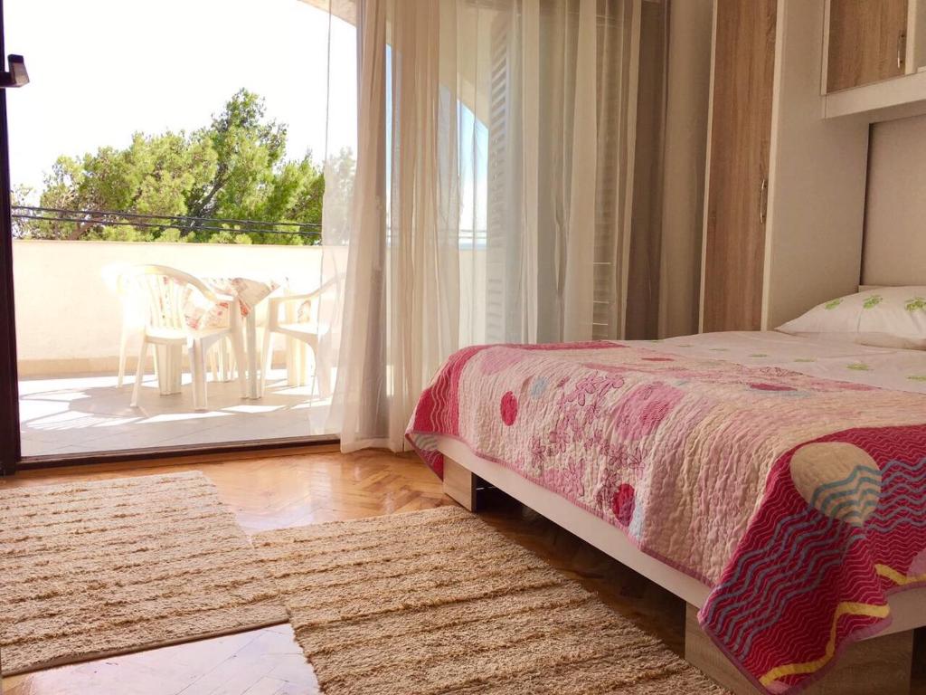 Postel nebo postele na pokoji v ubytování Apartment Martinovic