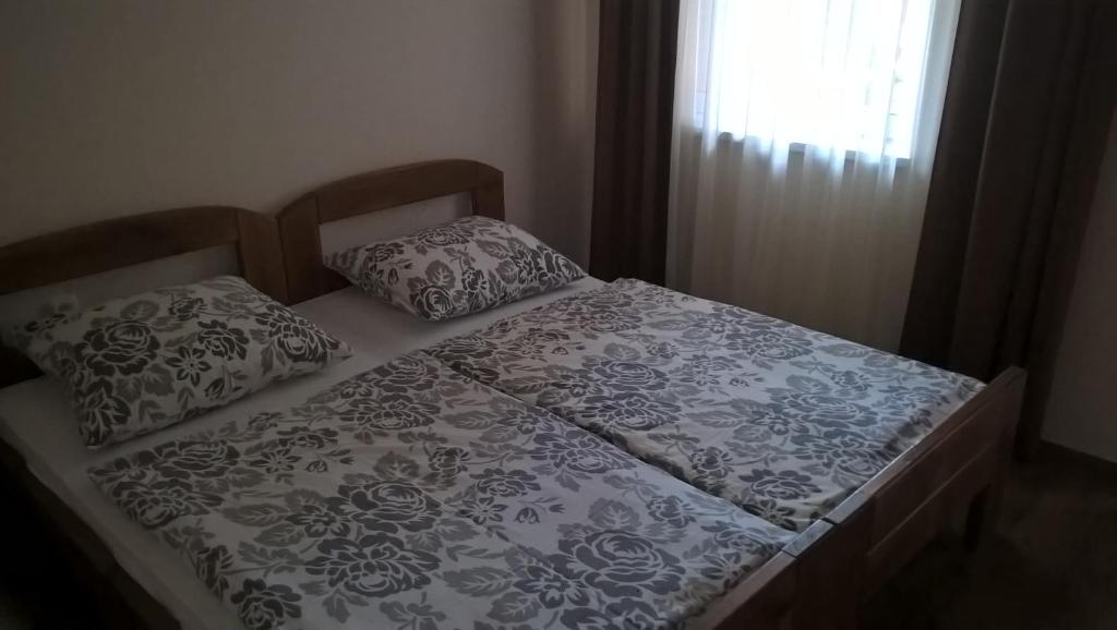 Postel nebo postele na pokoji v ubytování Aquacentrum