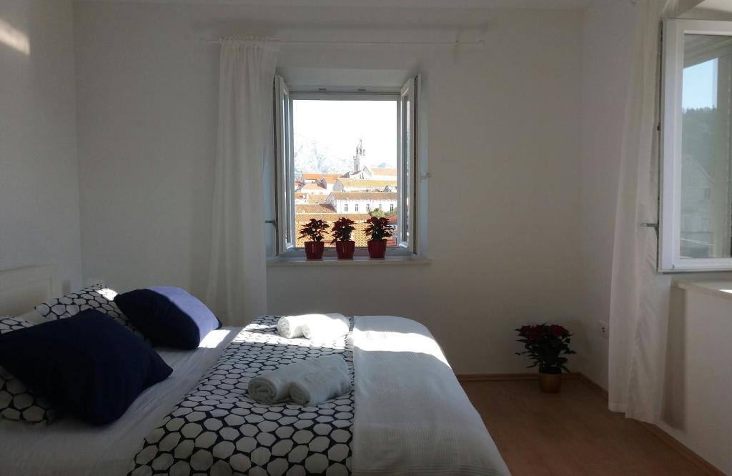 Posteľ alebo postele v izbe v ubytovaní Apartments An Ni