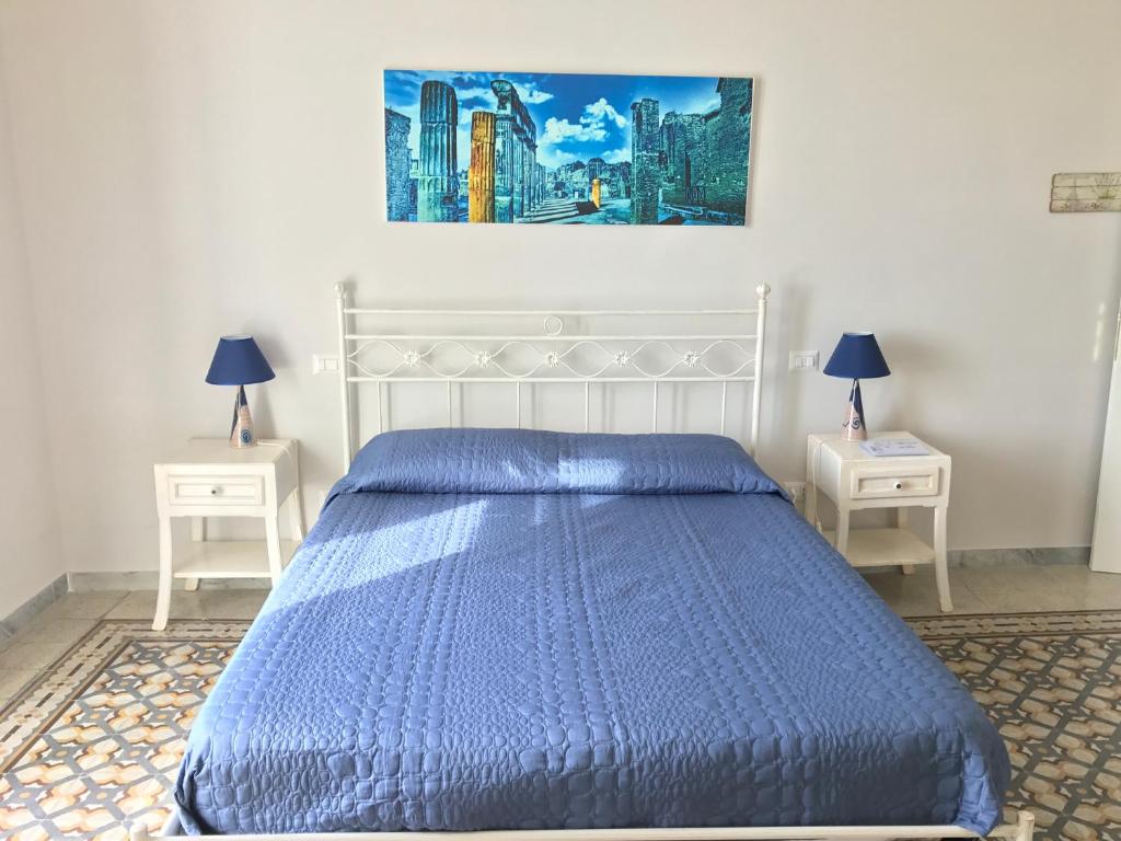 Posteľ alebo postele v izbe v ubytovaní villa verde sul mare