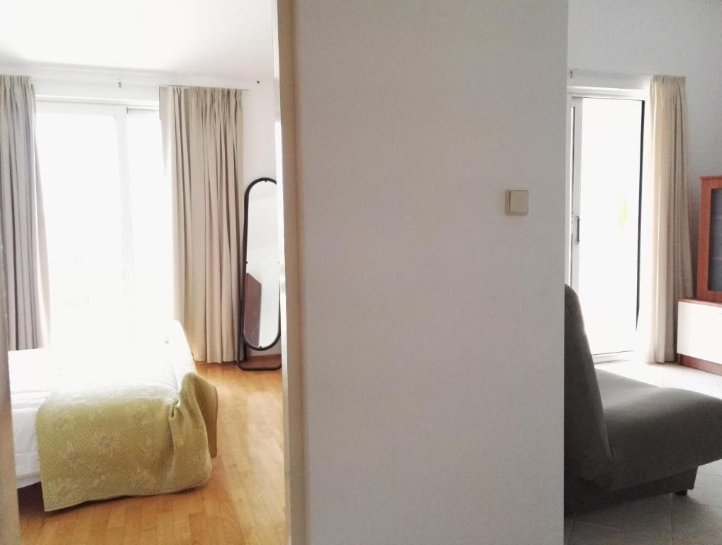 Postel nebo postele na pokoji v ubytování Apartments Rede