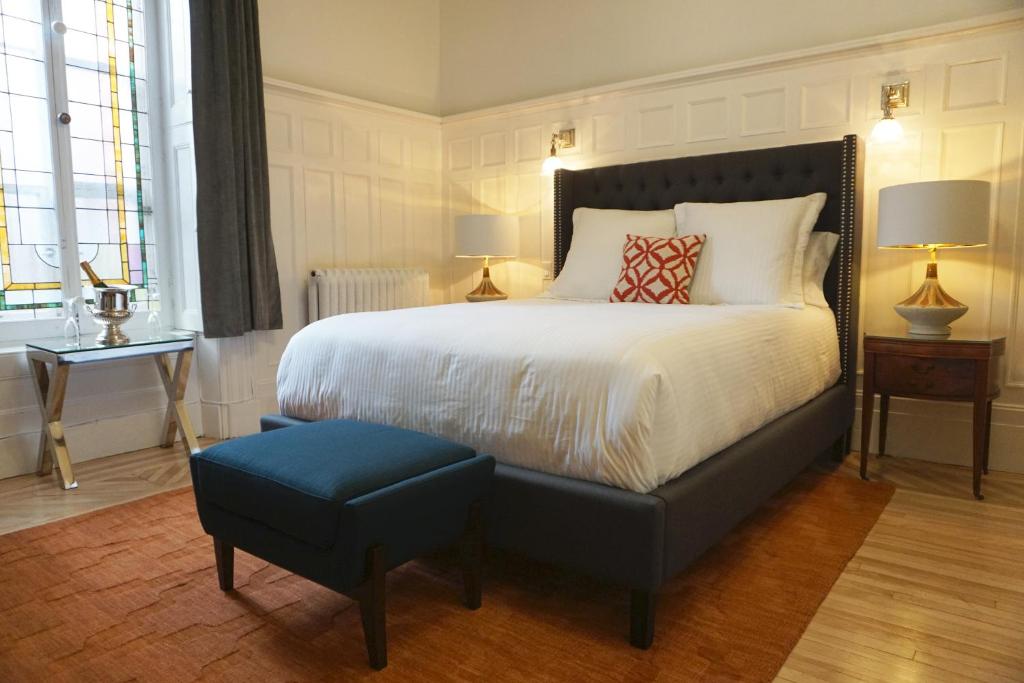 Postel nebo postele na pokoji v ubytování Hôtel Marie-Rollet