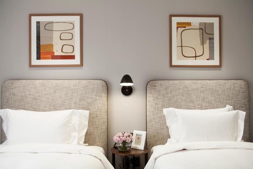 Postel nebo postele na pokoji v ubytování G2 Hotel Myeongdong