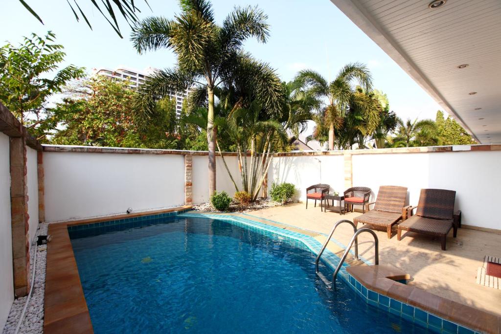 Bazén v ubytování Hidden Palm Pool Villas nebo v jeho okolí